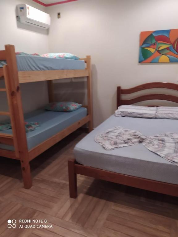 Postel nebo postele na pokoji v ubytování Mandala Hostel Maragogi Oficial