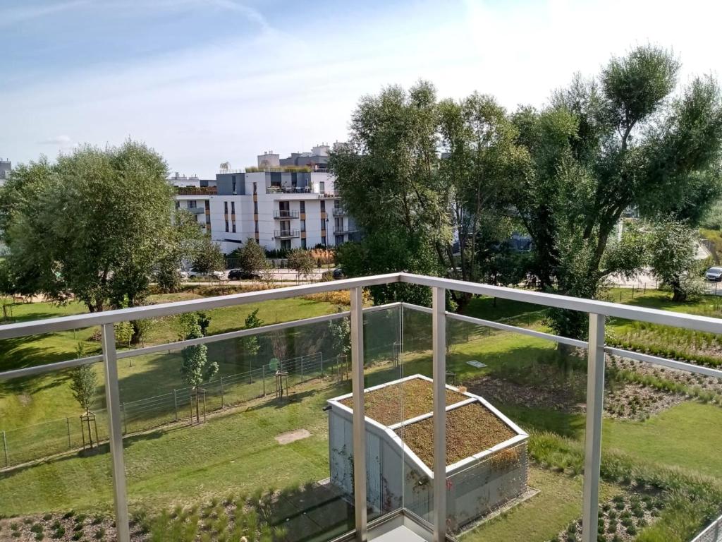 Vonkajšia záhrada v ubytovaní Cozy Apartment in Wilanów