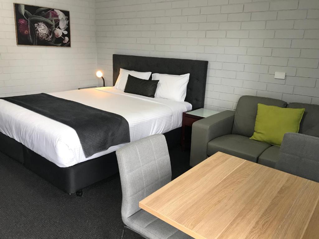 Postel nebo postele na pokoji v ubytování Frewville Motor Inn