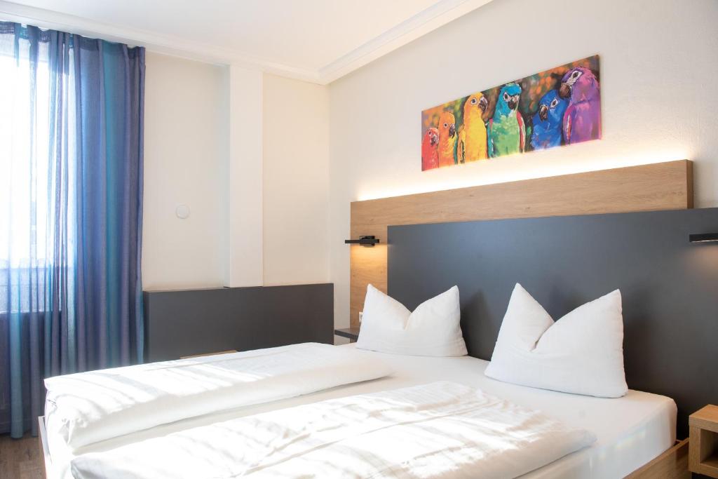 Postel nebo postele na pokoji v ubytování Hotel Avisa