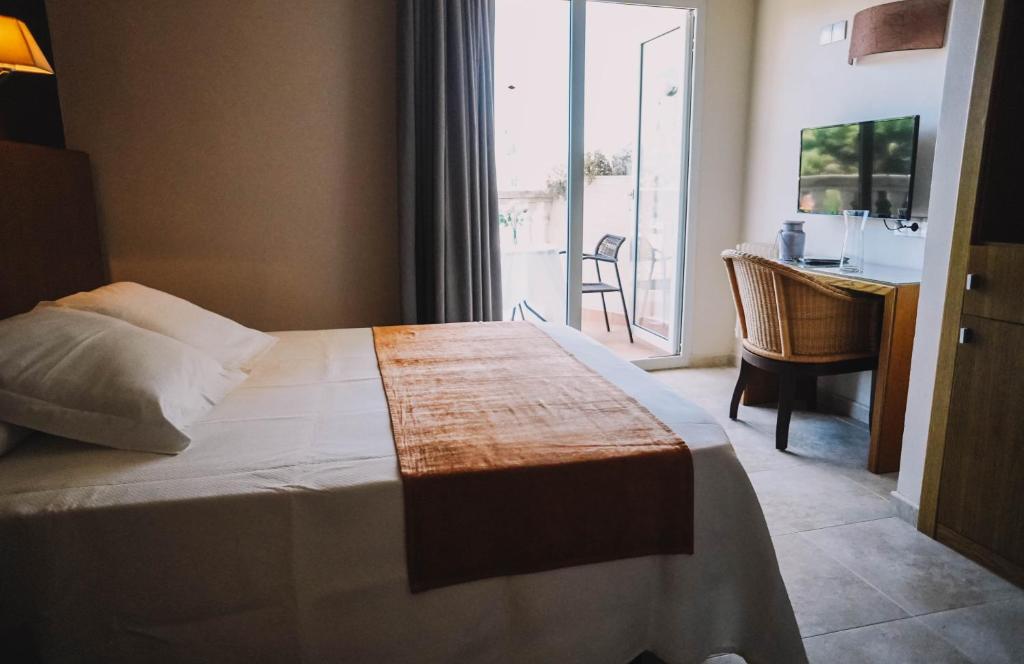 Posteľ alebo postele v izbe v ubytovaní Hotel Alba Seleqtta