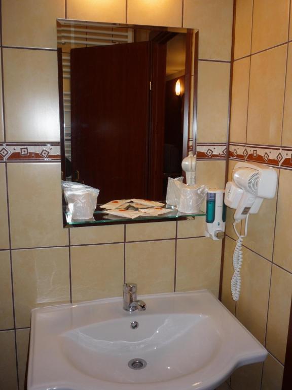Koupelna v ubytování Hotel Sud