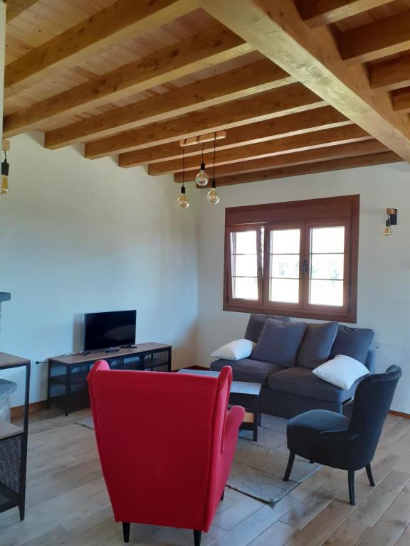 Posezení v ubytování Apartamentos y Casa La Paredana, agroturismo