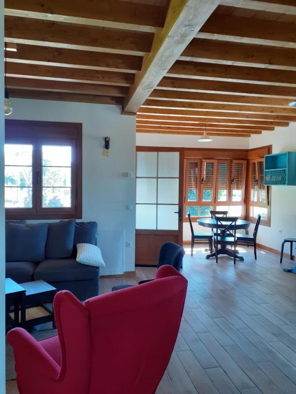 Posezení v ubytování Apartamentos y Casa La Paredana, agroturismo