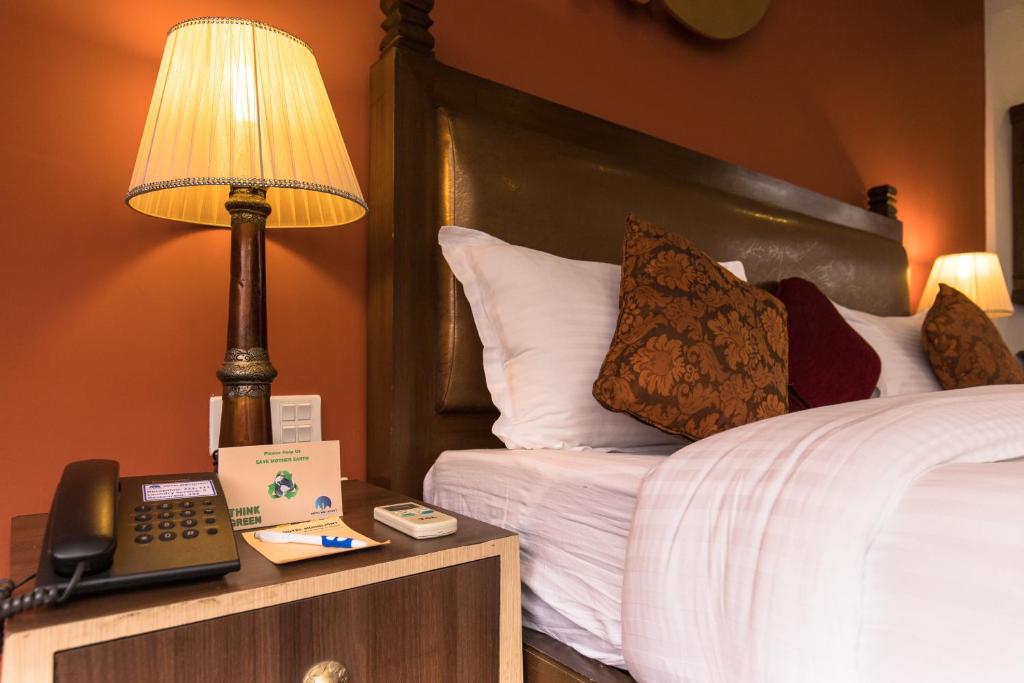 Postel nebo postele na pokoji v ubytování Hotel Moonlight