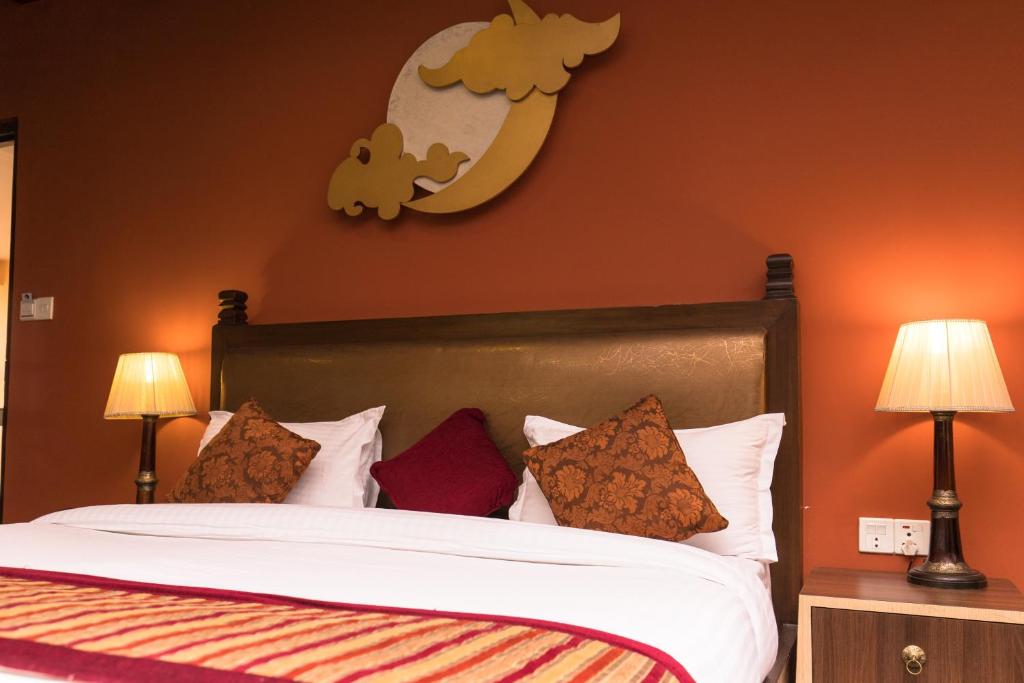Postel nebo postele na pokoji v ubytování Hotel Moonlight