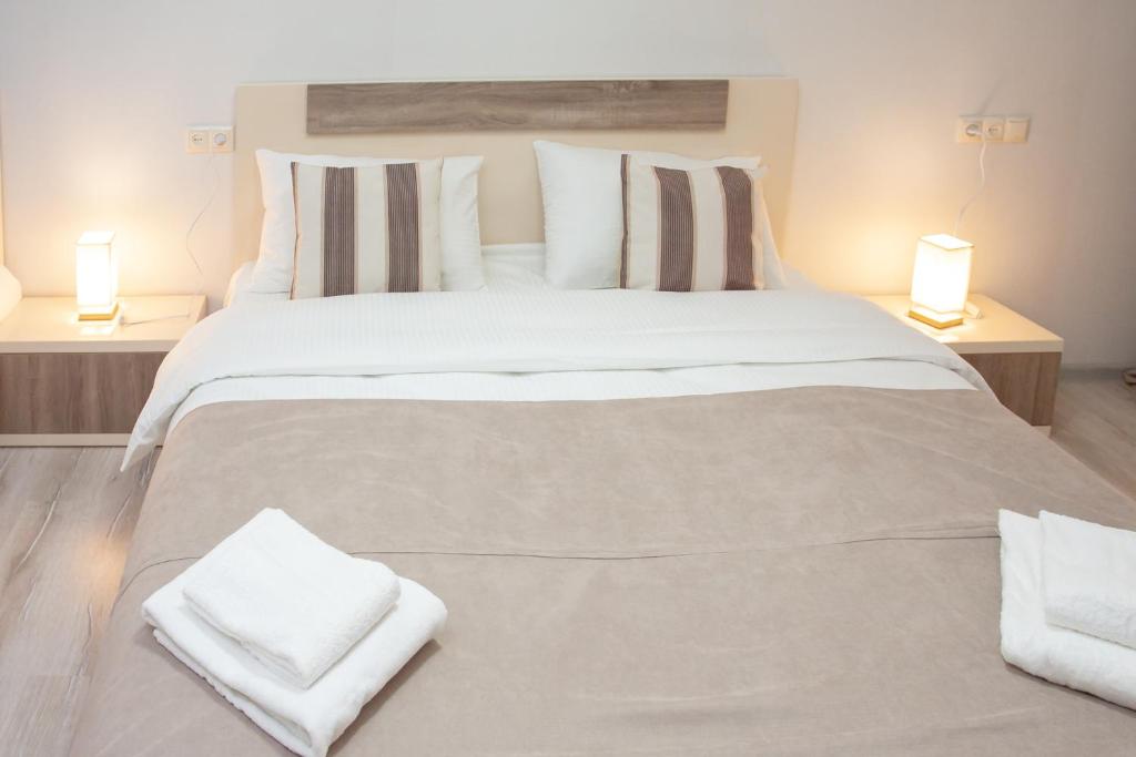 Postel nebo postele na pokoji v ubytování Hotel Casa calda