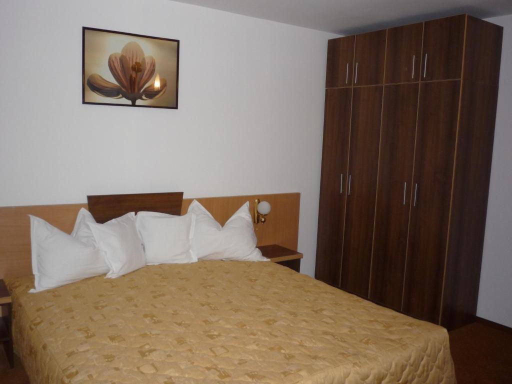 Postel nebo postele na pokoji v ubytování Hotel Sud