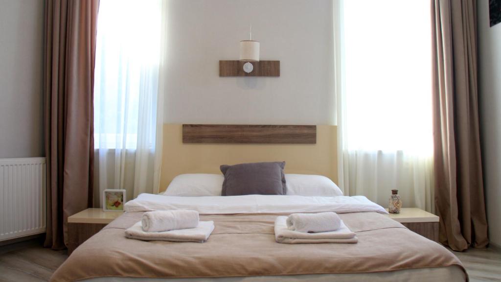 Postel nebo postele na pokoji v ubytování Hotel Casa calda