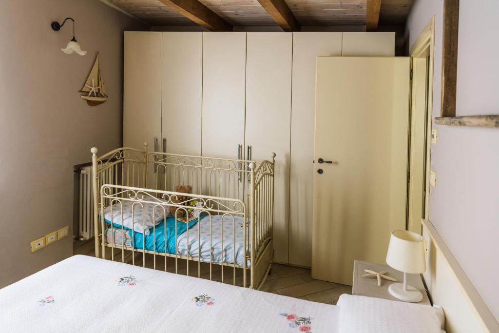 Voodi või voodid majutusasutuse Cà Tabachera toas