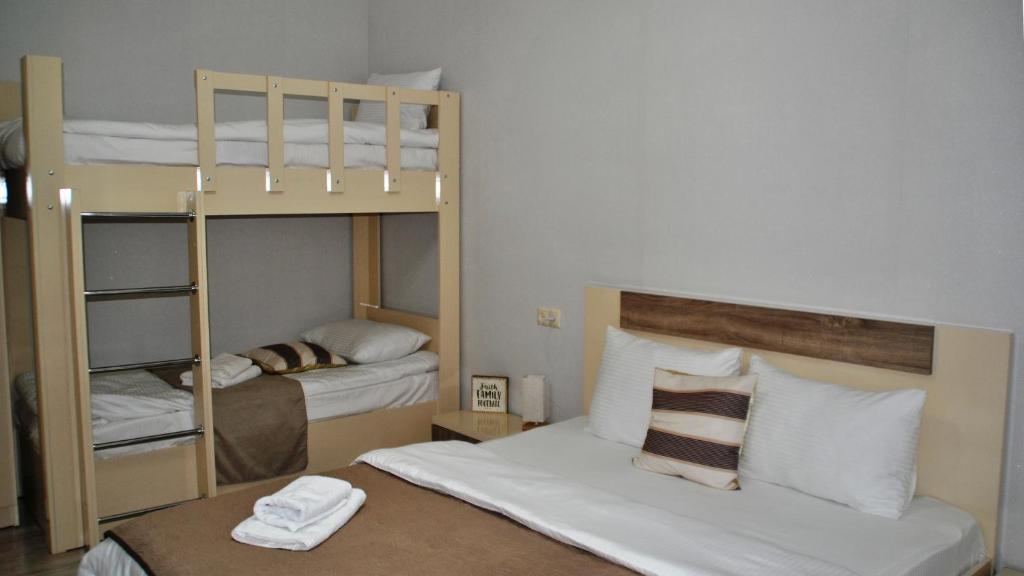 Postel nebo postele na pokoji v ubytování Hotel Casa calda