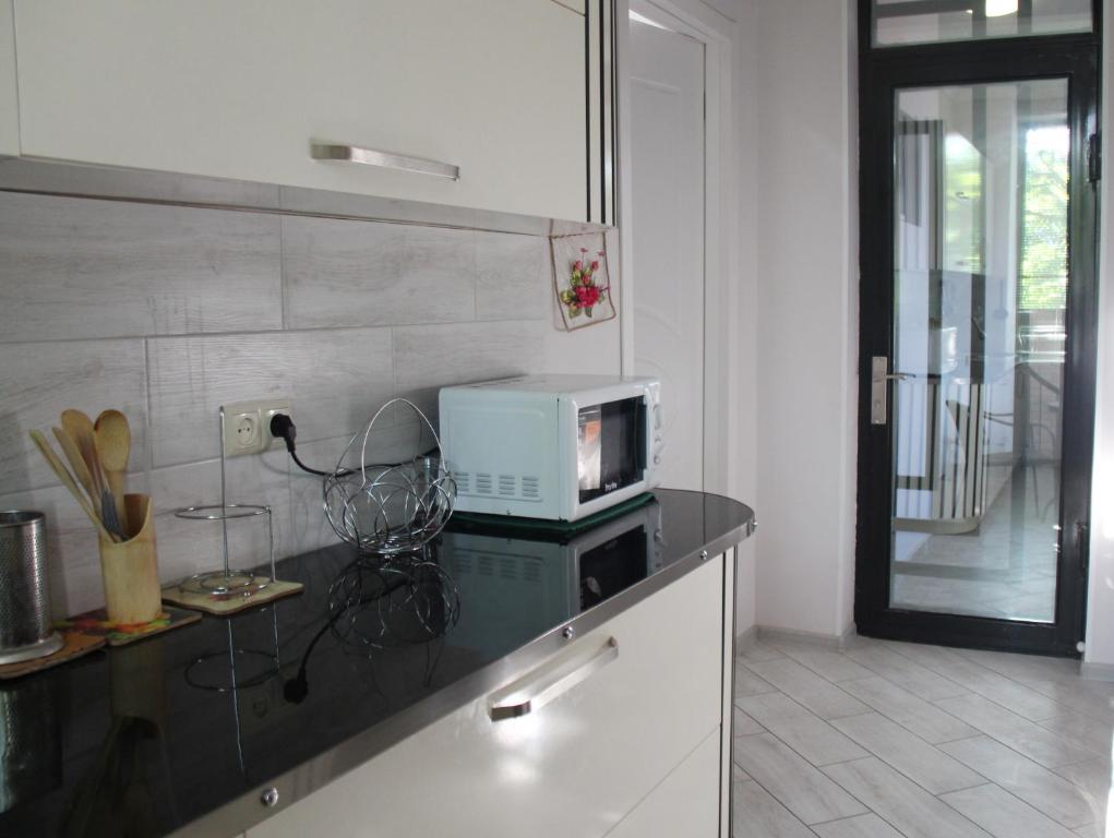 Kuchyň nebo kuchyňský kout v ubytování Hotel Casa calda