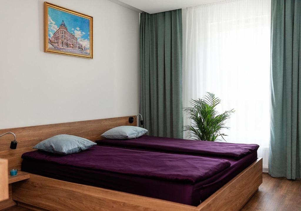 Posteľ alebo postele v izbe v ubytovaní VIP Apartament number 7