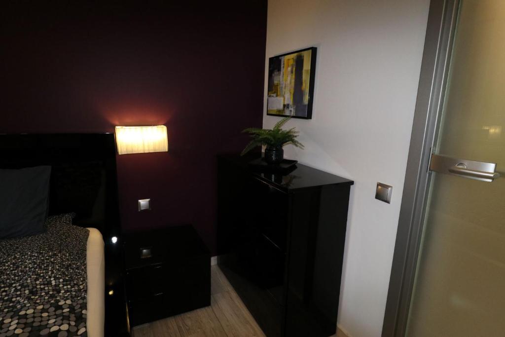 Posteľ alebo postele v izbe v ubytovaní Apartament Ala