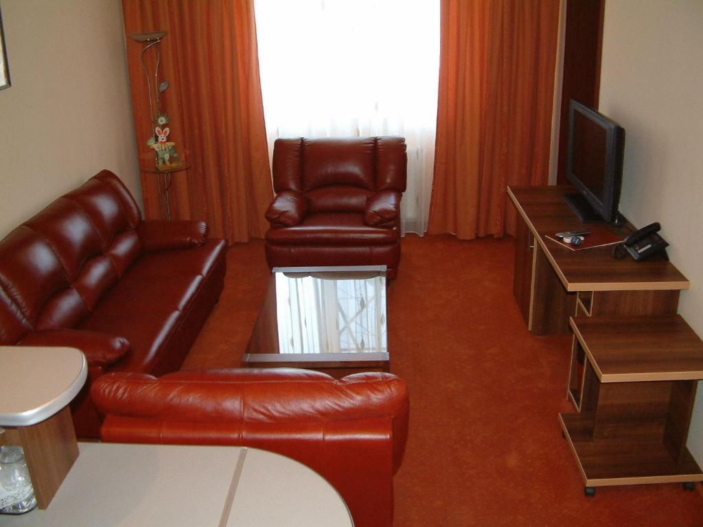 TV a/nebo společenská místnost v ubytování Hotel Sud