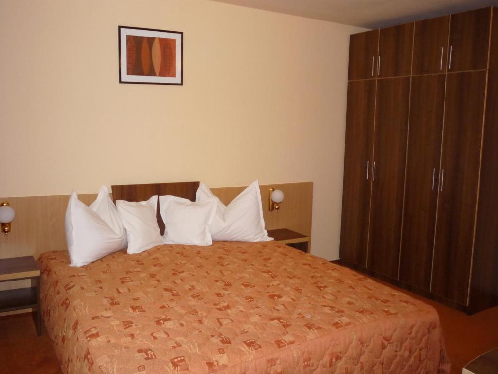 Postel nebo postele na pokoji v ubytování Hotel Sud