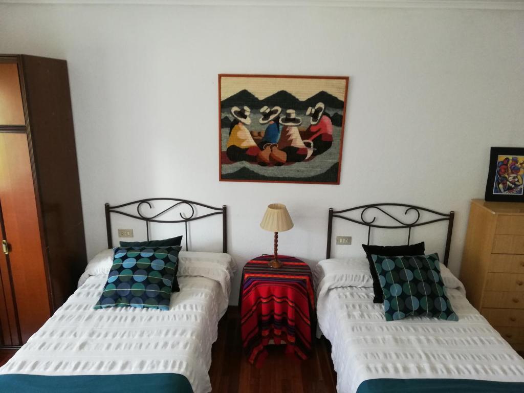 Postel nebo postele na pokoji v ubytování Chez Pitu