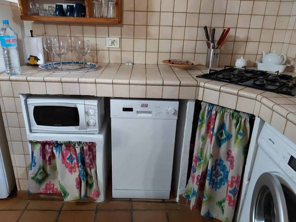 Kuchyň nebo kuchyňský kout v ubytování Casa los Abuelos
