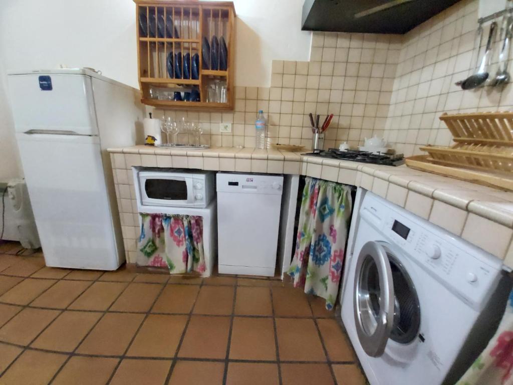Kuchyň nebo kuchyňský kout v ubytování Casa los Abuelos