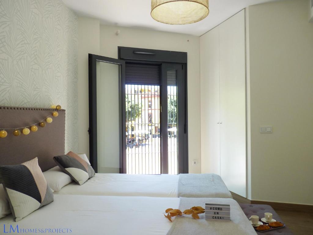 Posteľ alebo postele v izbe v ubytovaní ALAMEDA SQUARE APARTMENT