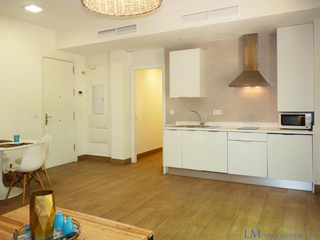 Kuchyňa alebo kuchynka v ubytovaní ALAMEDA SQUARE APARTMENT