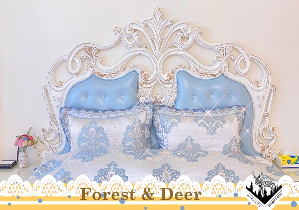Postel nebo postele na pokoji v ubytování Forest Deer Black Tea Homestay