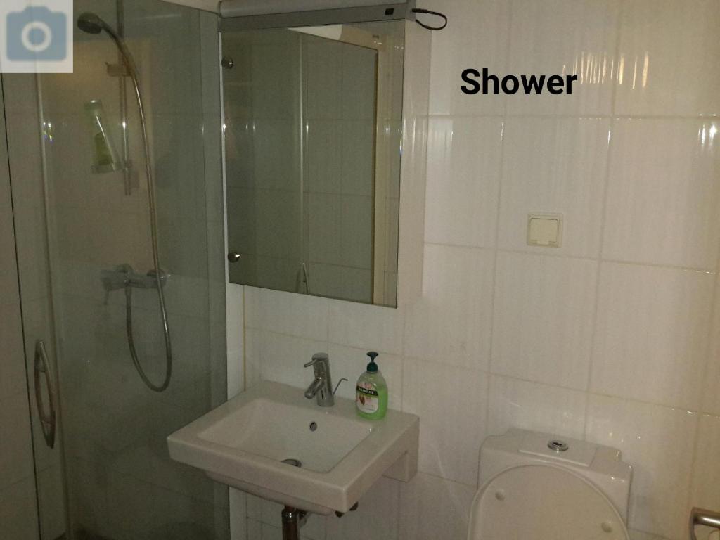 Koupelna v ubytování Apartments Rotermanni