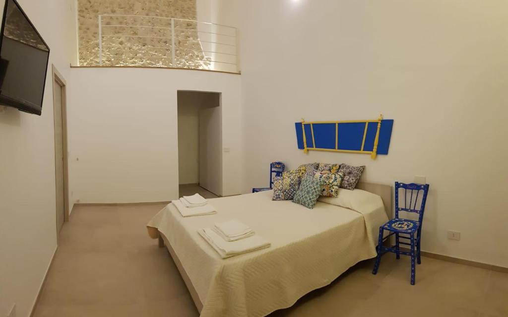 Posteľ alebo postele v izbe v ubytovaní Casa Vacanze Brezza di Gaffe
