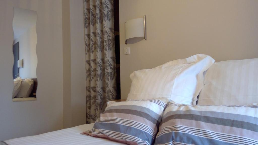 Postel nebo postele na pokoji v ubytování Hôtel/Restaurant C'Vall