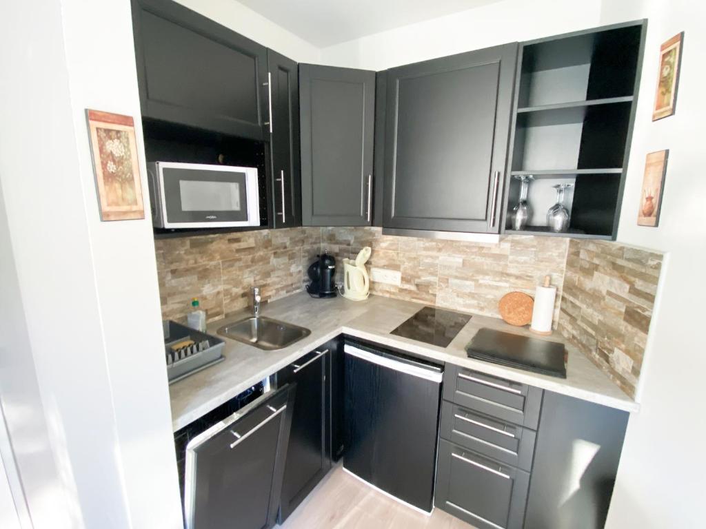 Kuchyň nebo kuchyňský kout v ubytování Miky Apartmán Klínovec