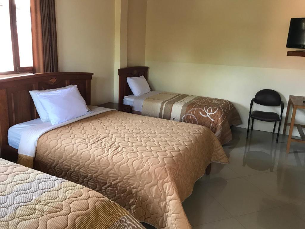 Postel nebo postele na pokoji v ubytování Hosteria Shell
