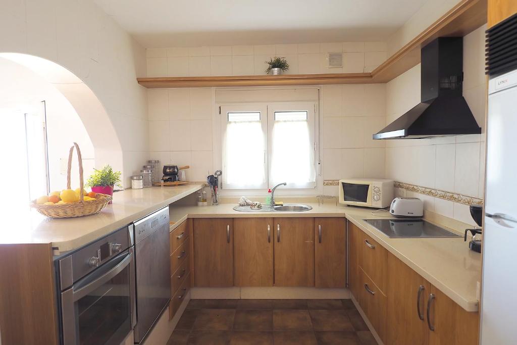 Kuchyň nebo kuchyňský kout v ubytování Casa Soleada