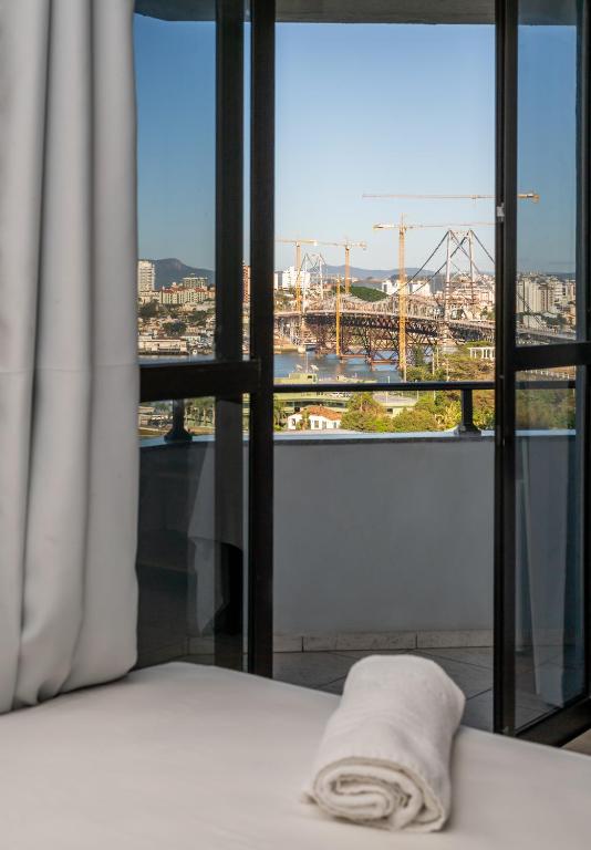 Postel nebo postele na pokoji v ubytování Lumar Hotel