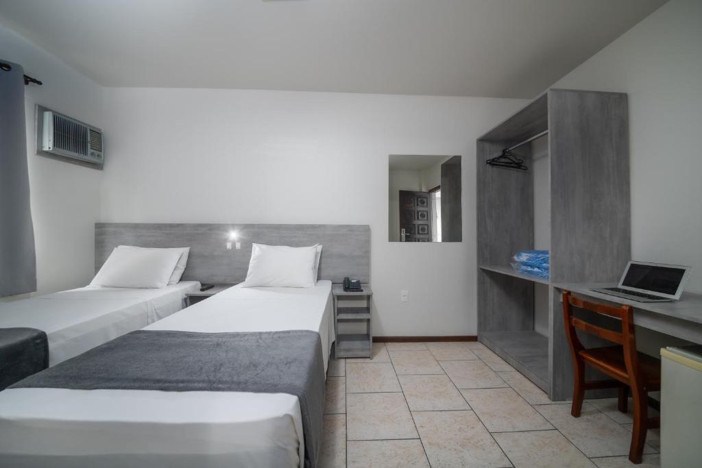 Postel nebo postele na pokoji v ubytování Lumar Hotel