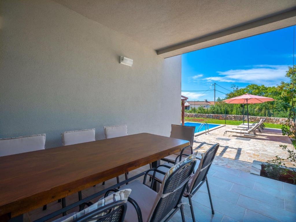Balkón nebo terasa v ubytování Holiday Home Marko by Interhome