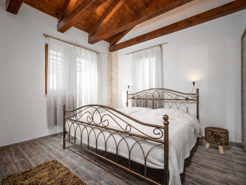 Postel nebo postele na pokoji v ubytování Holiday Home Marko by Interhome