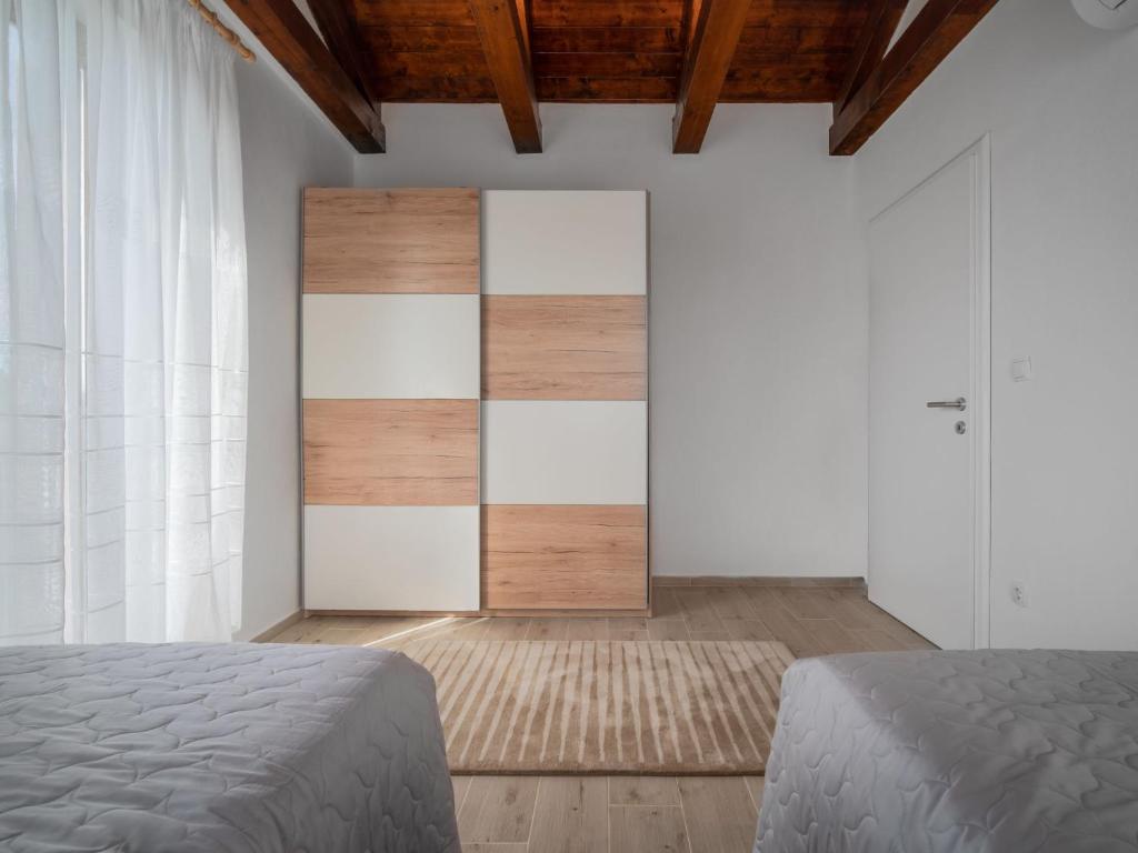 Postel nebo postele na pokoji v ubytování Holiday Home Marko by Interhome