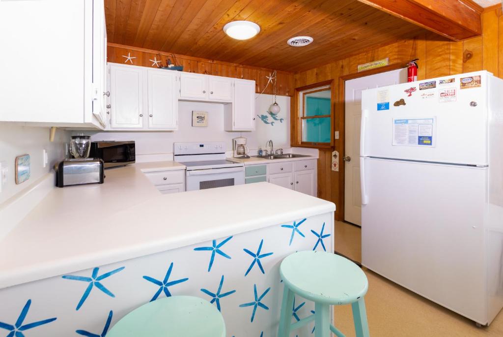 Kuchyň nebo kuchyňský kout v ubytování Beach Baby