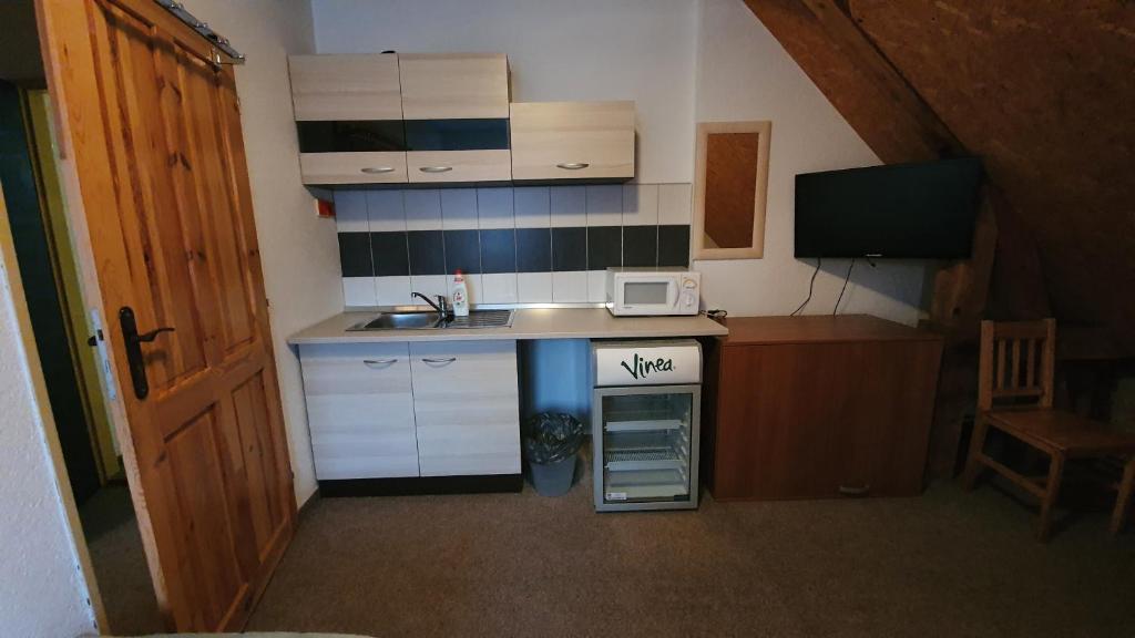 Kuchyň nebo kuchyňský kout v ubytování Ranč u Sedmi Kulí