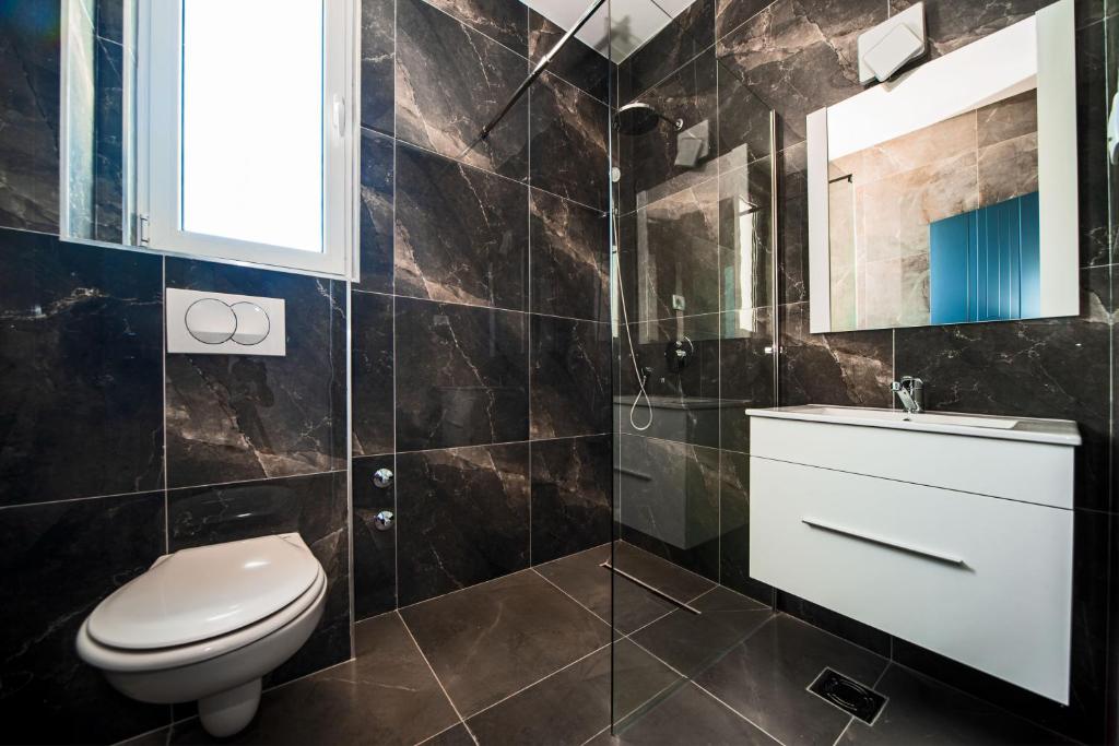 Koupelna v ubytování David Lux beach rooms