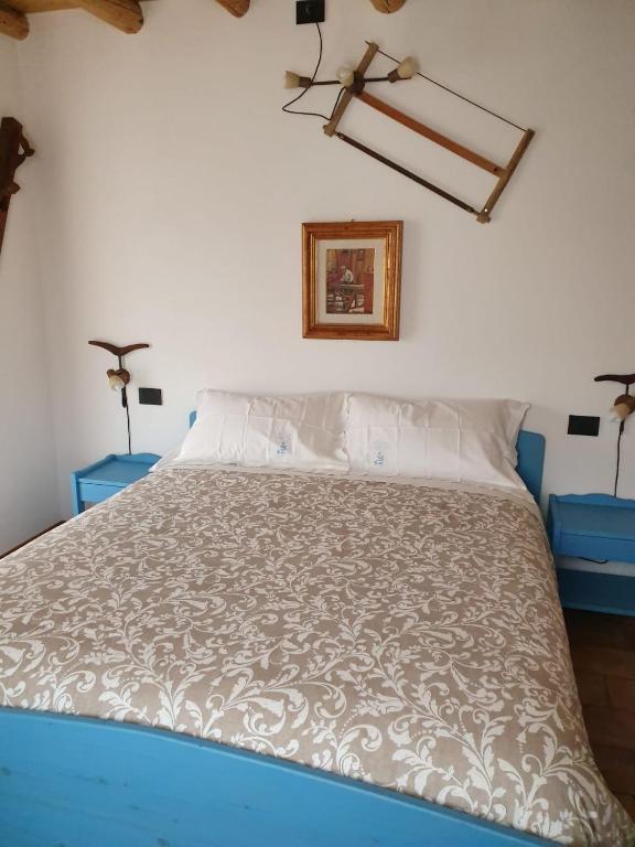 Postel nebo postele na pokoji v ubytování BB IL CIPPO