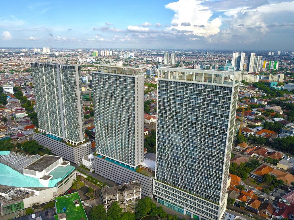 an aerial view of a city with tall buildings at Menteng Park Exclusive Emerald in Jakarta