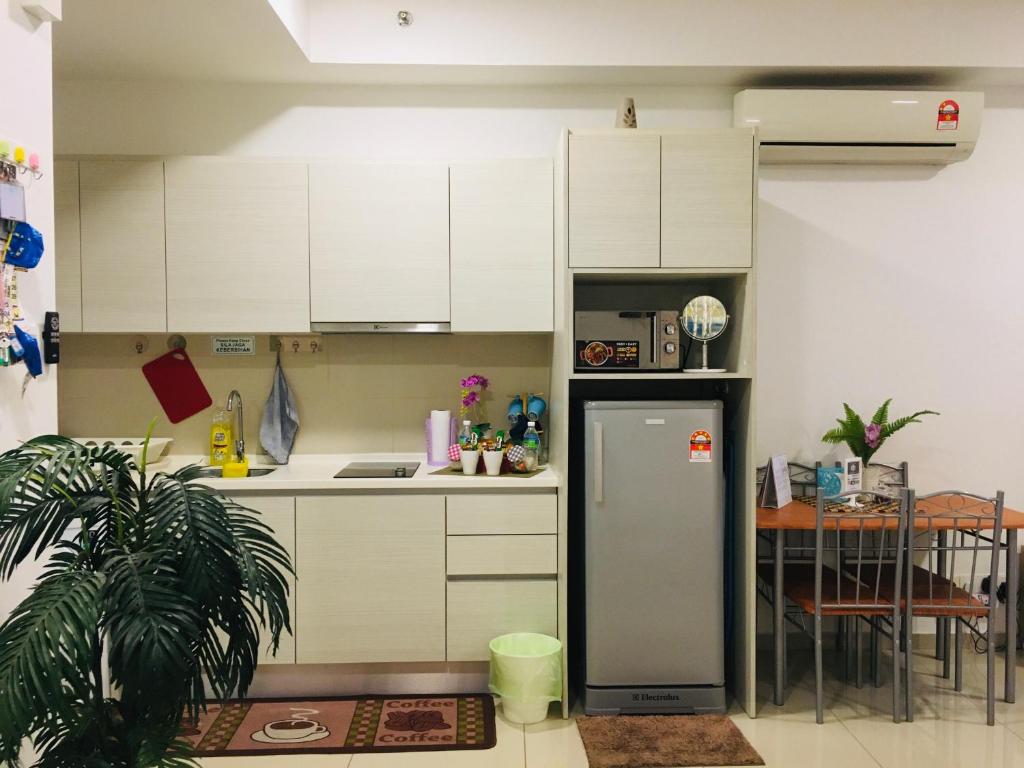 Kuchyň nebo kuchyňský kout v ubytování D'Gunduls Homestay STUDIO by DGH I-CITY