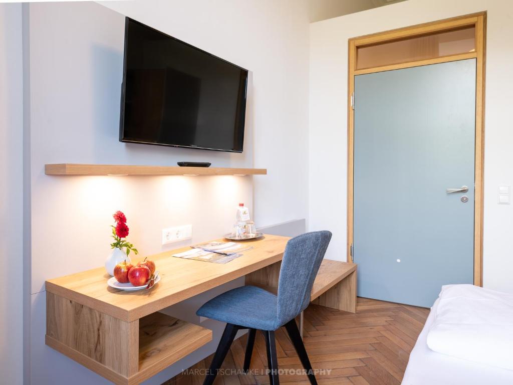 TV a/nebo společenská místnost v ubytování Schlosshotel Horneck