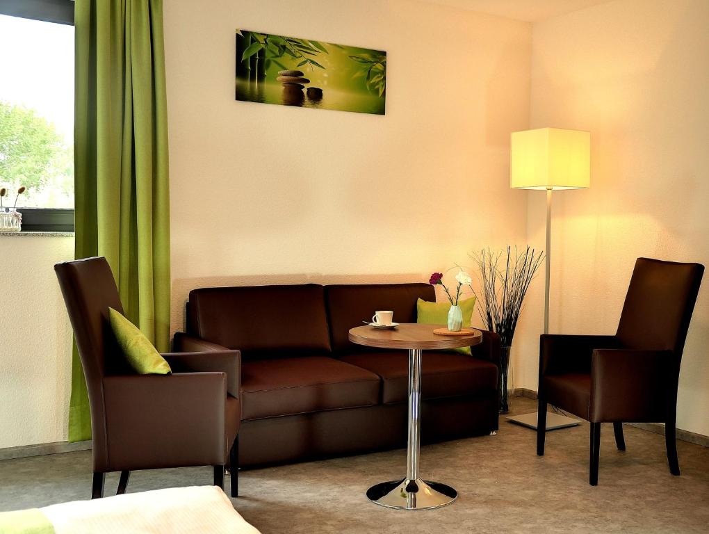 Posezení v ubytování Motel am Fürfelder Schloss