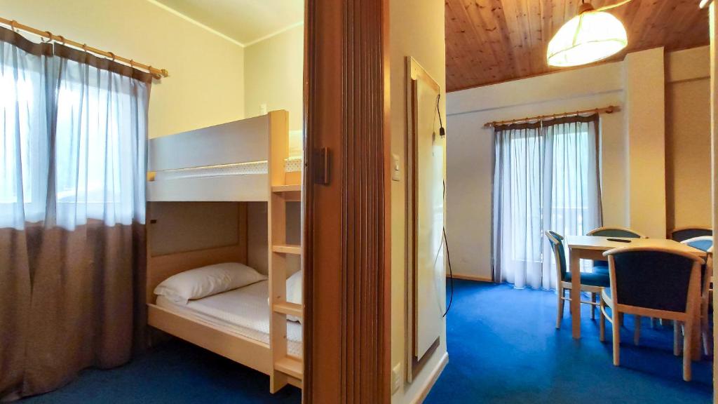 Postel nebo postele na pokoji v ubytování Hotel Principe Marmolada