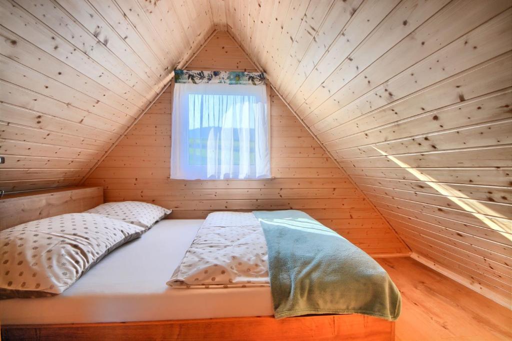 Postel nebo postele na pokoji v ubytování JAFERÓWKA Domki w górach