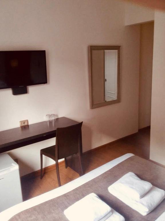 TV a/nebo společenská místnost v ubytování Hotel Alvear