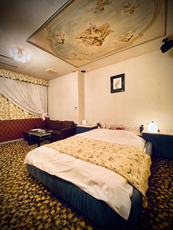 Postel nebo postele na pokoji v ubytování Hotel Sagano (Adult only)