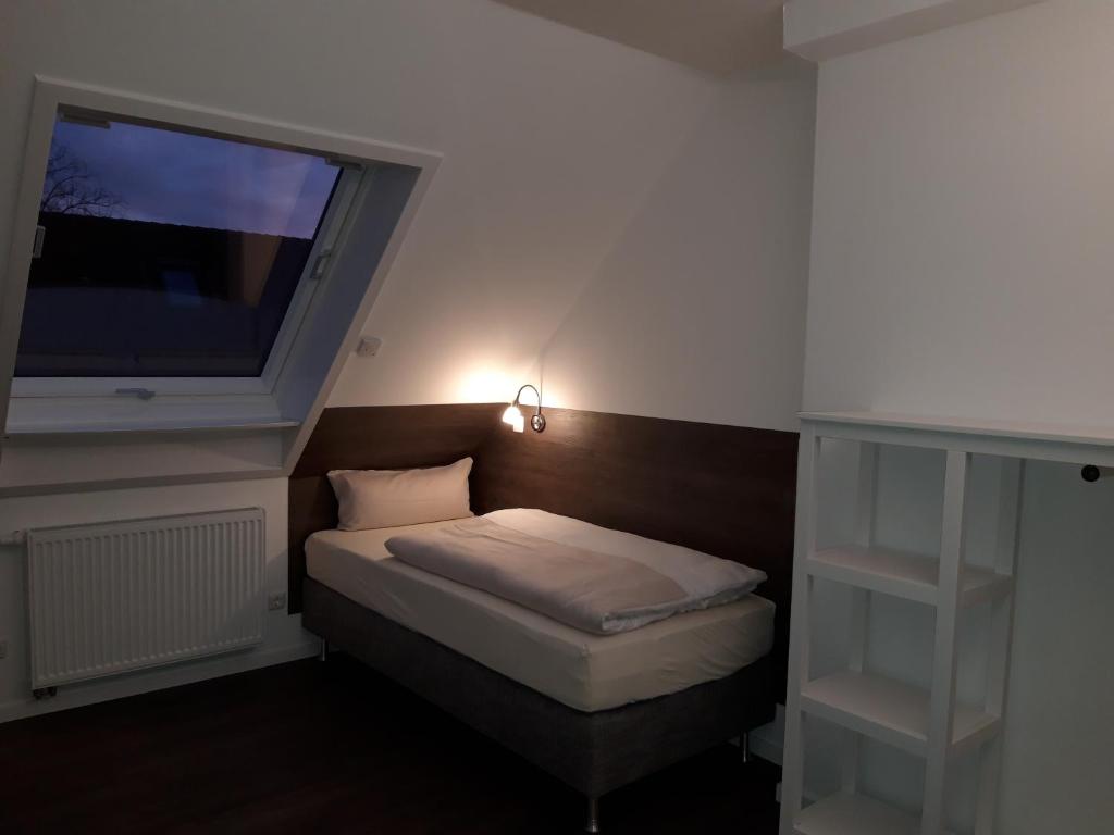 Letto o letti in una camera di Hotel Weinert
